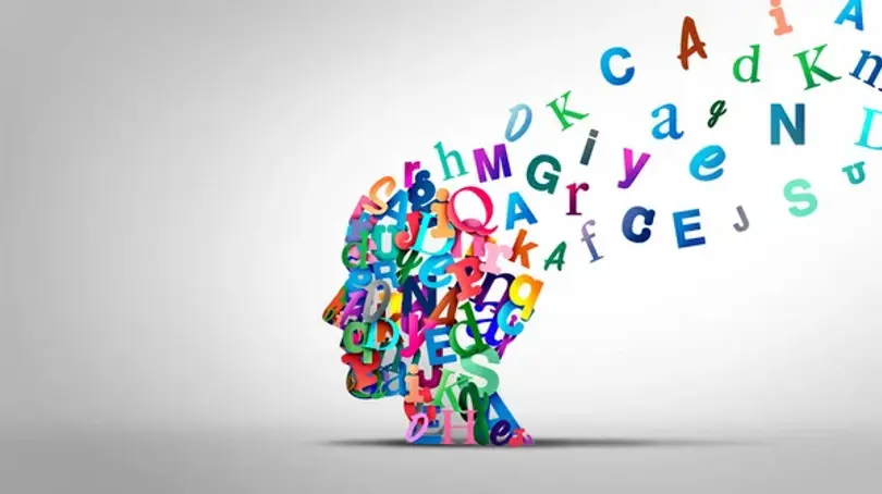 Illustration of a head with a jumble of letters to symbolise SEO, AEO and GEO arcronyms